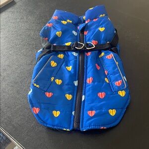 Dog Coat: Pretty Blue with multi colored heart pattern ,fleece lined coat.